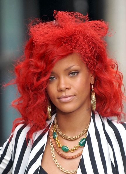rihanna red hair curly hair. Rihanna Does It Again!